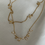 Thumbnail: CLOVER STUDDED CHARM NECKLACE