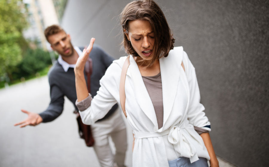Couple arguing, woman distressed by love problem