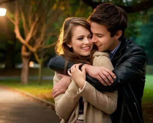 Smiling couple embracing, representing love problem solution