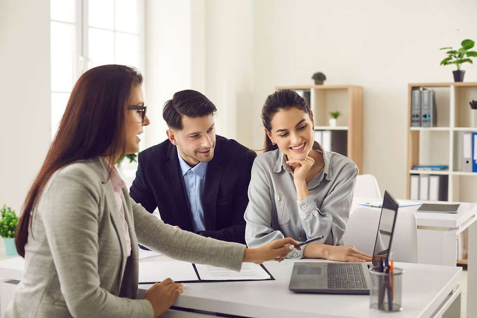 Parents discussing their preferred school to their real estate agent and asking for suggestions.