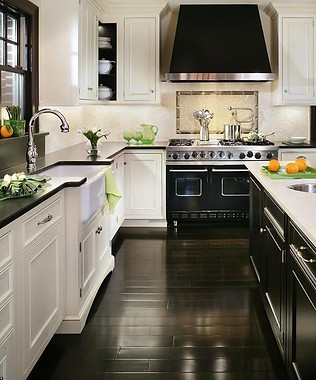 11-polished-black-wood-floors-complement-the-design-of-this-art-deco-kitchen.jpeg