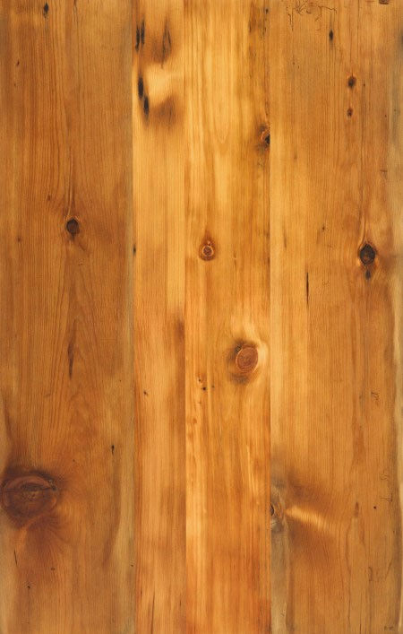 Antique Reclaimed White Pine flooring showing warm natural tones and smooth reclaimed texture.
