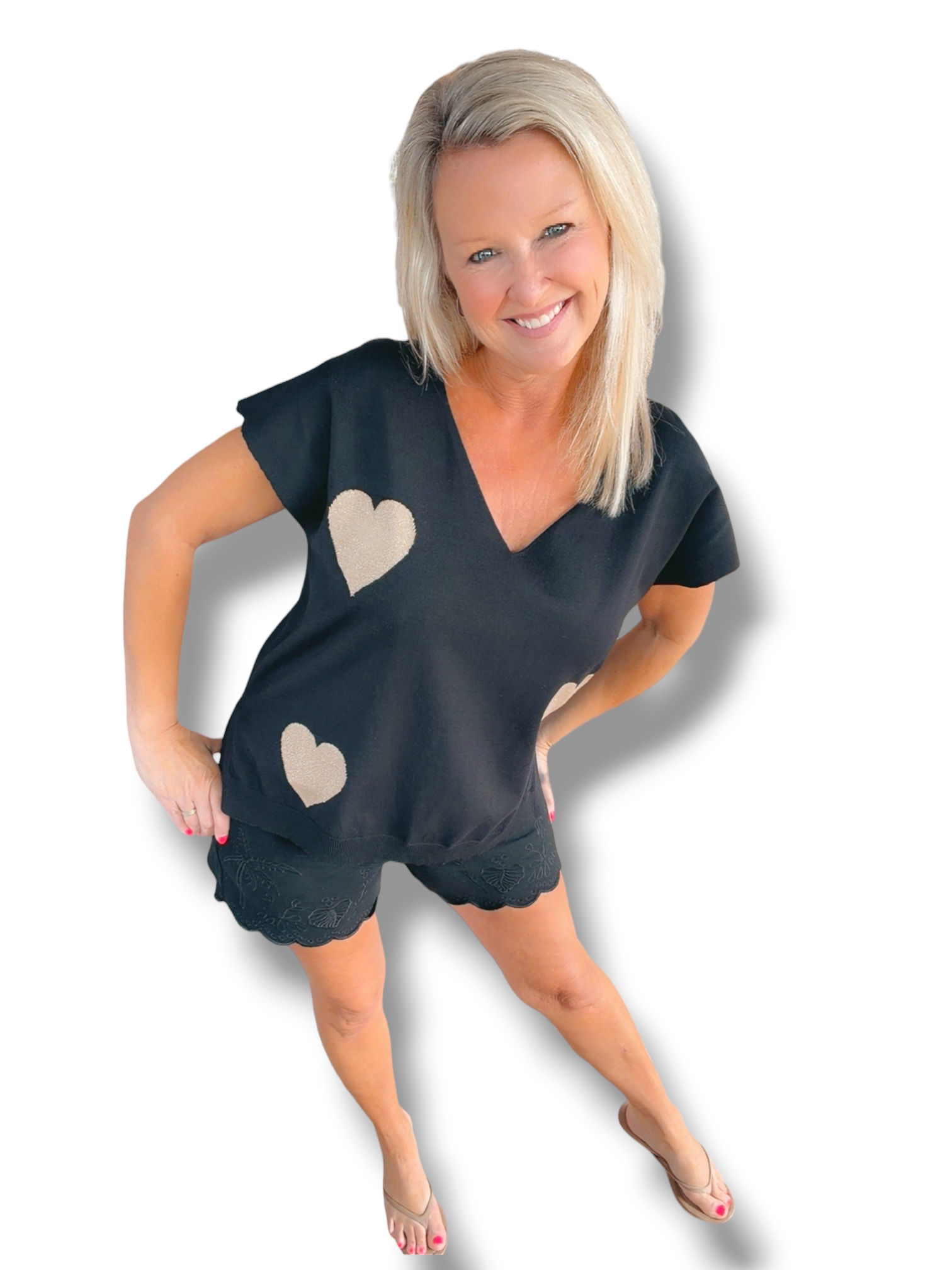 Licht gebreid t-shirt met hartjes zwart