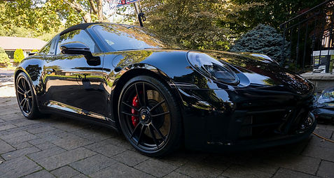 Porsche 911 after mobile maintenance detailing service in Toronto driveway