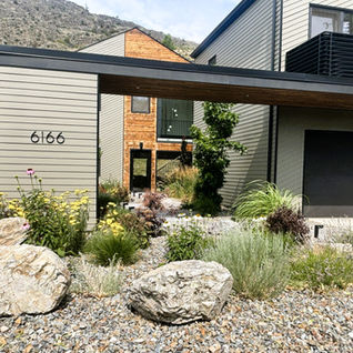 Modern home at 6166 with xeriscaped front garden