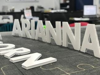 White 3D letters spelling ARIANNA