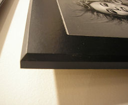 Dark framed black-and-white portrait