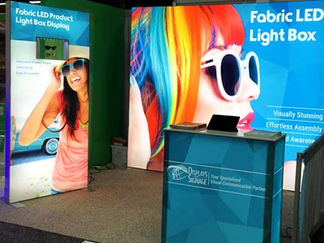 Trade show booth displaying Fabric LED Light Boxes