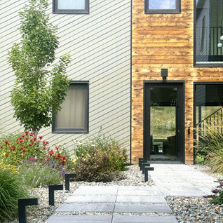 Modern building exterior with wood and metal siding