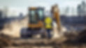 Construction worker in hi-vis vest near yellow excavator on dirt site.