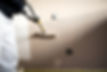 Handy man decorating walls with paint