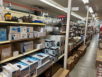 Aisle in a marine services store with shelves of parts