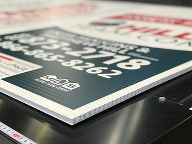 Corrugated sign with MGS Mortgage Group, call 877-277-7118