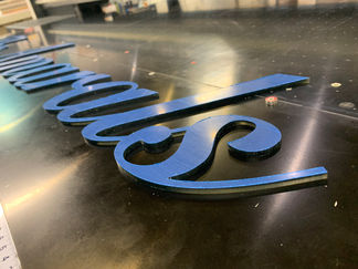 Blue dimensional letters