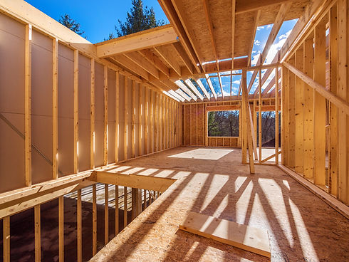Interior view of a wood-framed house under construction