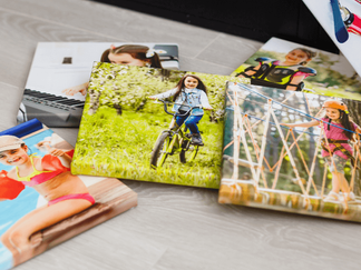 Assorted canvas prints featuring children's activity photos