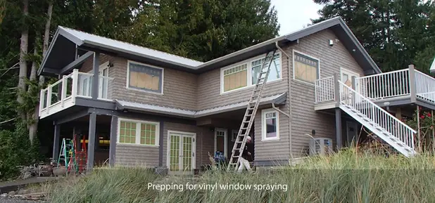 Prepping the outside windows before spraying
