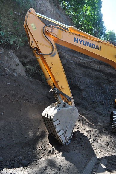 Hyundai excavator bucket digging soil