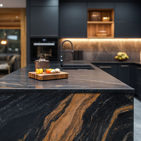 Modern kitchen island with black and gold granite countertop