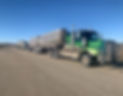 Heavy equipment: green semi-truck with tanker