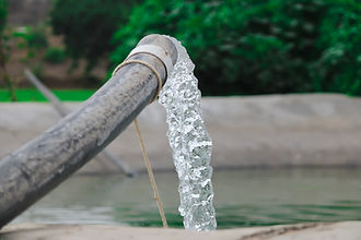Water gushing from a pipe