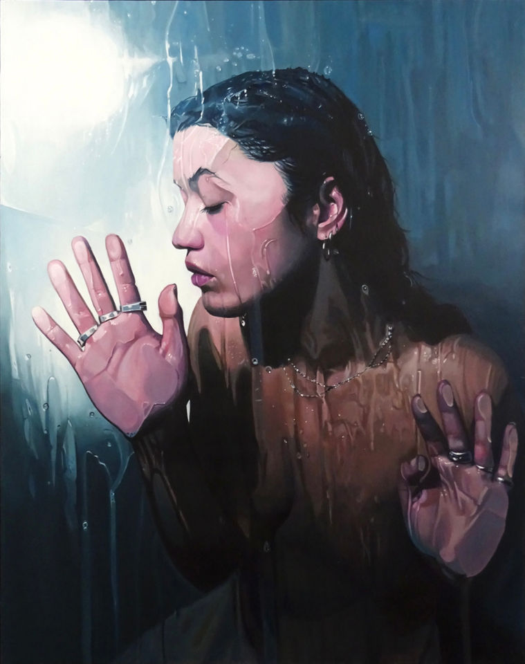 Beautiful female figure painted in the Hyperrealist style standing with face and hands pressed against glass pane under a stream of water.