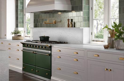 Kitchen stove backsplash green tile white quartz ledge