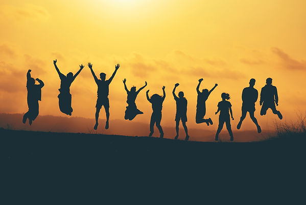 group-people-jumping-mountain-sunset-friends-party-happy-time.jpg