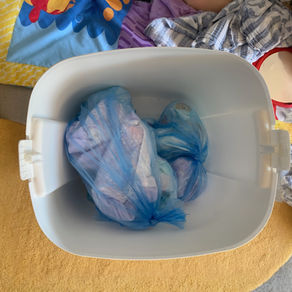 Nappy bin full of nappies