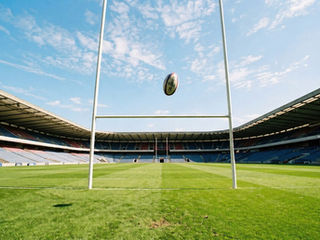 Rugby ball going over the posts for a conversion.