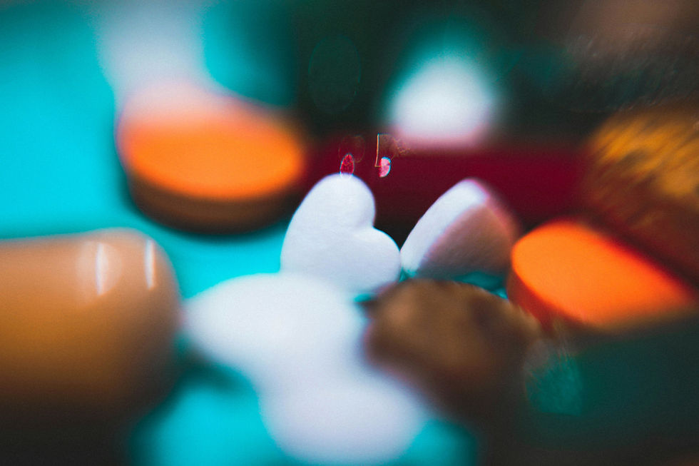 A scattering of pills in different colors