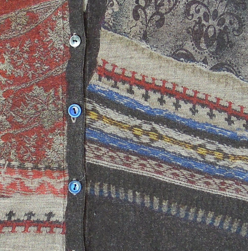 Pikkukuva: Detail of Insideout Knitted fairsile deconstructed cardigan printed T-shirt, collaboration Comme Des Garcons Trading museum