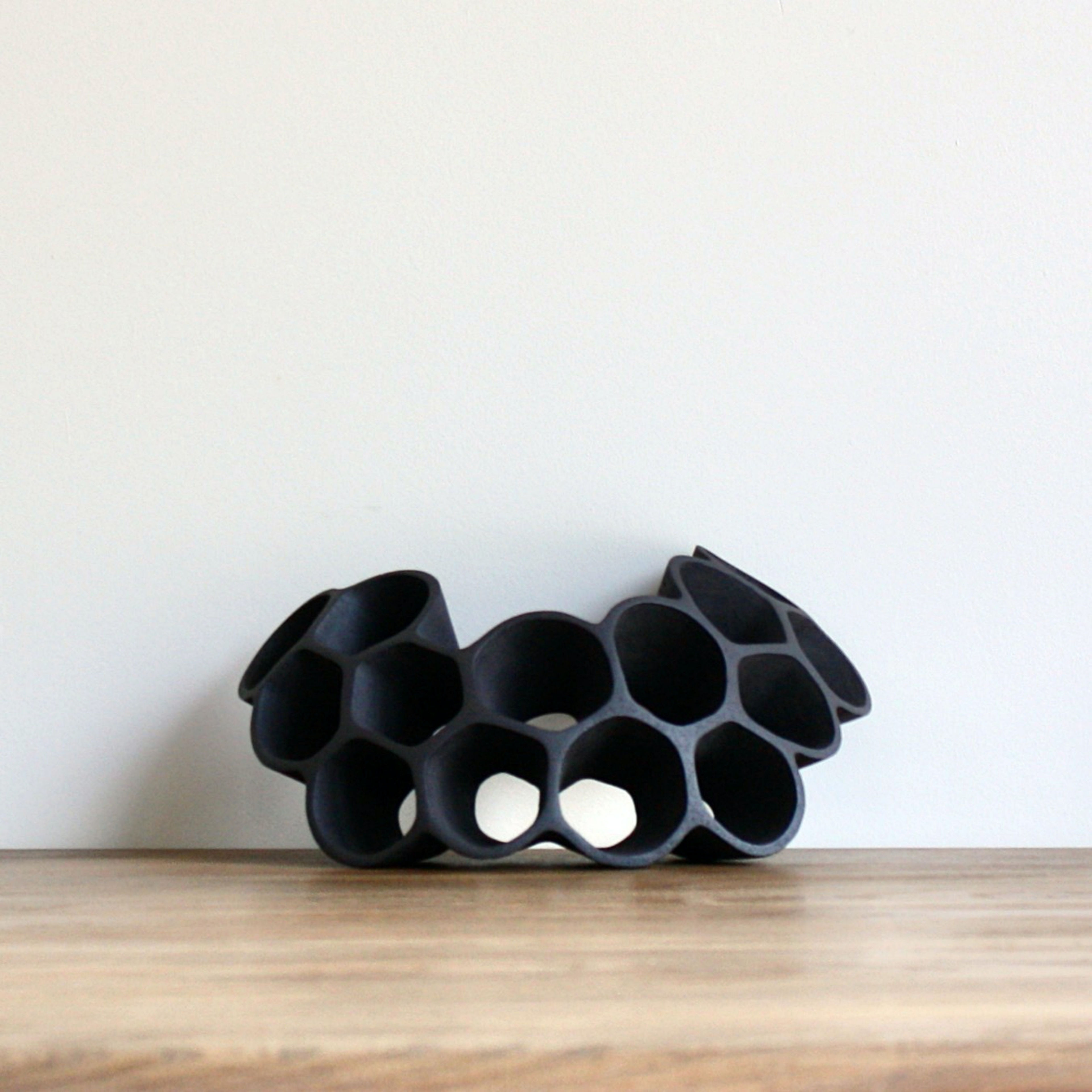 Black "Cellular" sculptural piece