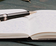 Notizbuch und Stift