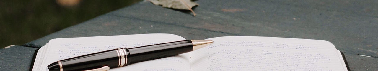 Caderno e caneta