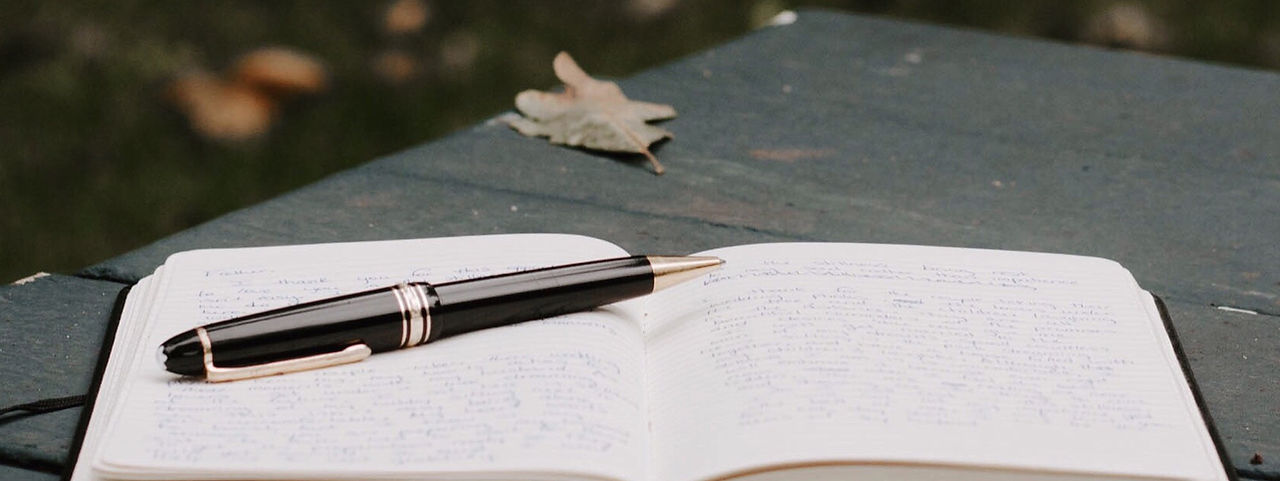 Notebook and Pen