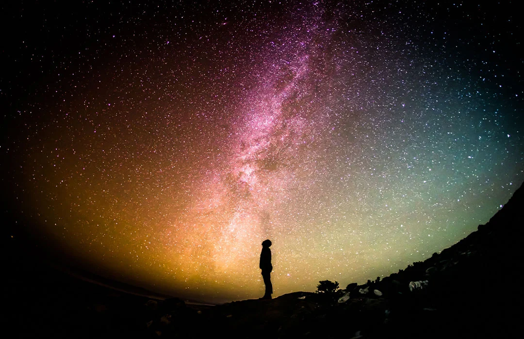 Stars with person meditating