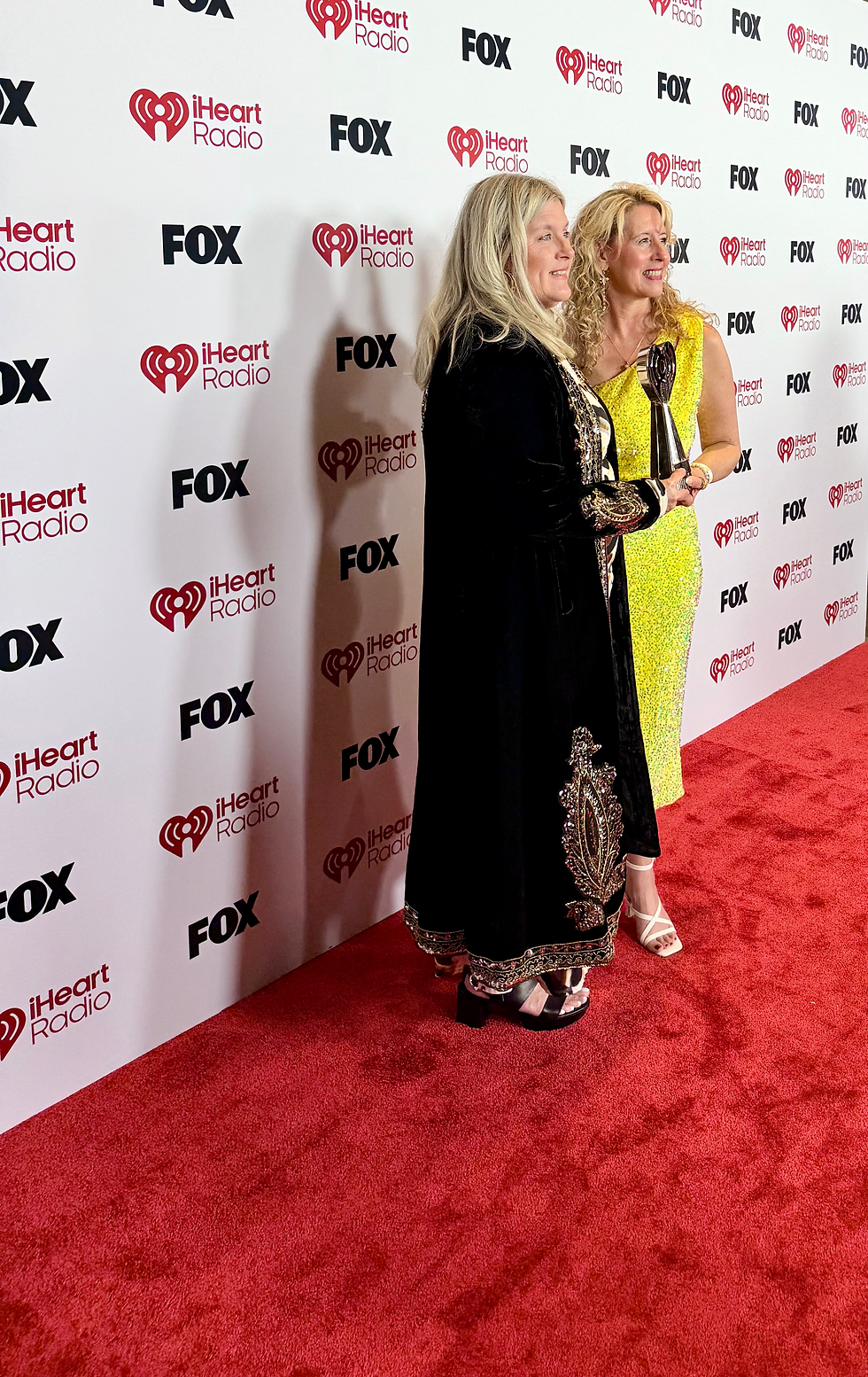 Pictured: Melissa Swonger & Erica Elliott; iHeart Music Awards Red Carpet; Los Angles, CA 2026