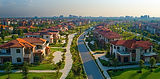 aerial-view-suburban-neighborhood-with-houses-roads-greenery.jpg
