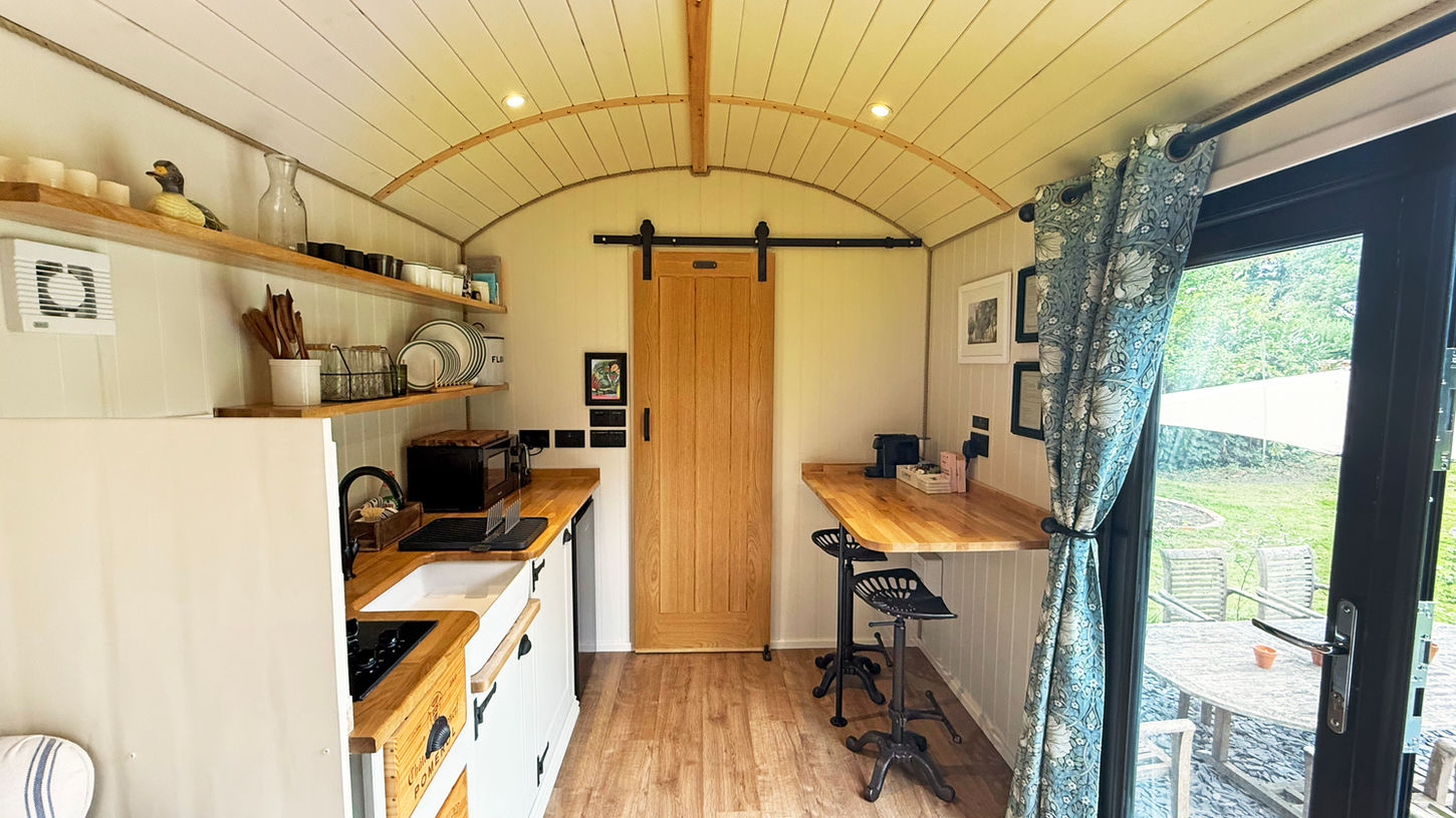 View towards the end of the hut where the kitchenette, breakfast bar and ensuite