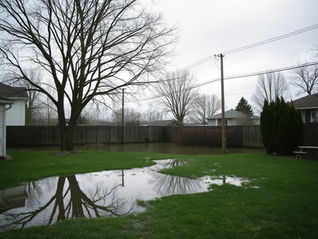 If You Think Heavy Rain Is the Reason Your Yard Floods… You're Thinking About It All Wrong.