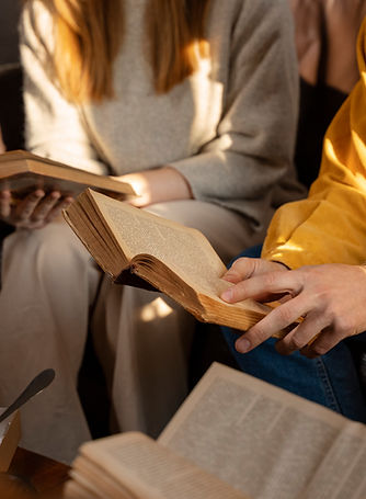 high-angle-people-reading-together.jpg