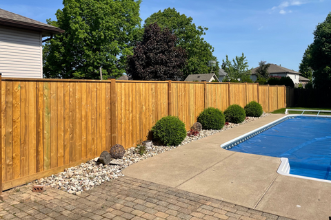 Wood fence by a pool