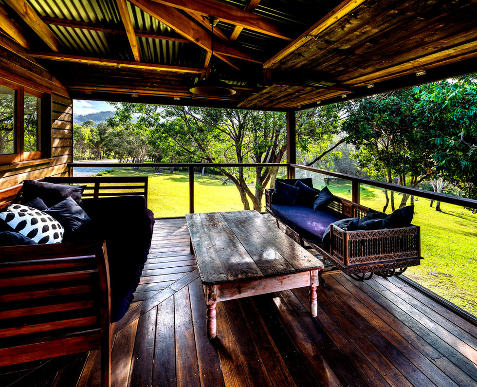 Rustic porch with scenic view, tranquilobeachhouse