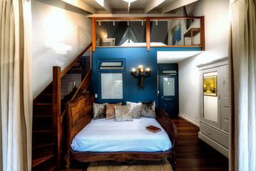 Tranquil Beach House bedroom: Loft, stairs, large bed