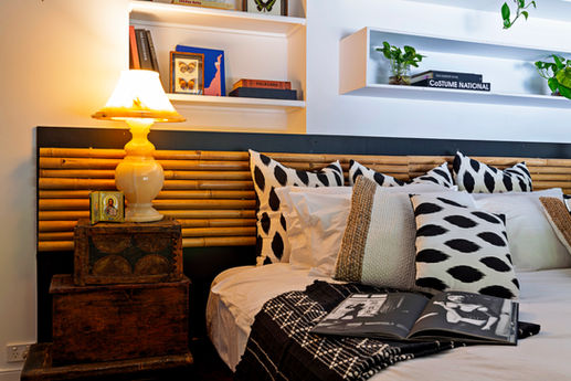 Large super king bed with an renovated accessible bathroom and a day bed on the verandah outside
