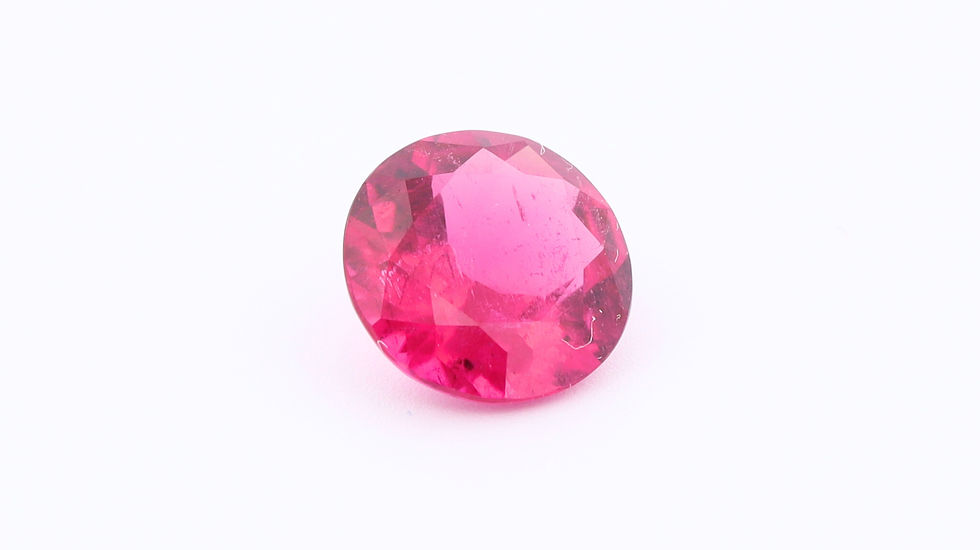 Side photo of a Vivid Pink round Rubellite Tourmaline
