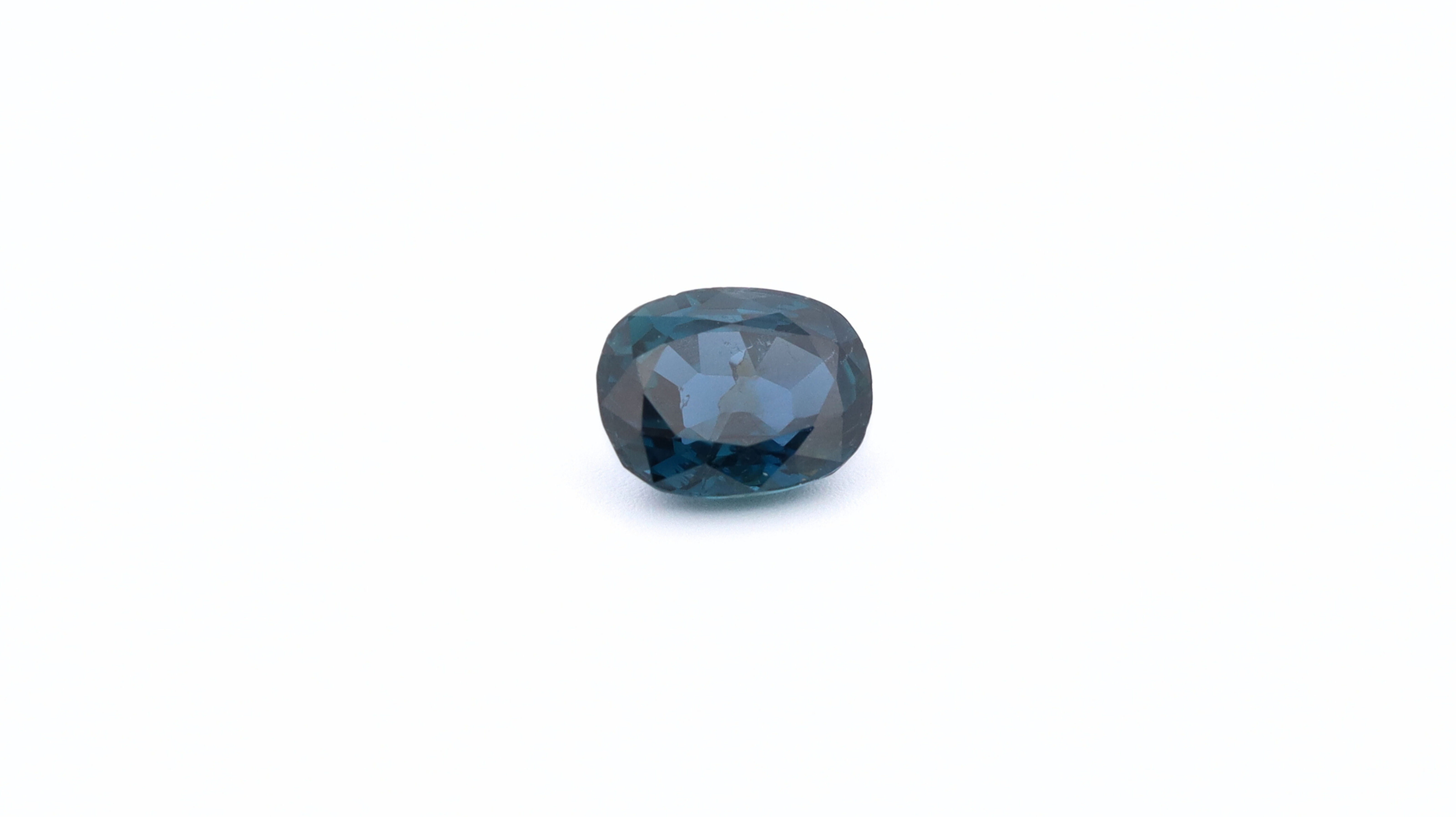 Front photo of a deep blue Sapphire, oval cut, measuring 5.82x4.48x3.14mm and weighting 0.81ct.