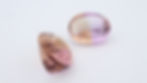 A pair of ametrines oval cut 19x15mm side view