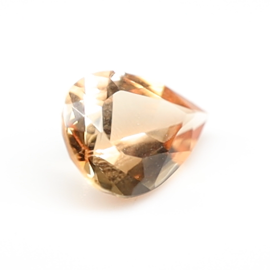Natural Imperial Topaz gemstone, 1.66 ct, precision cut, golden-orange color, face-up view.